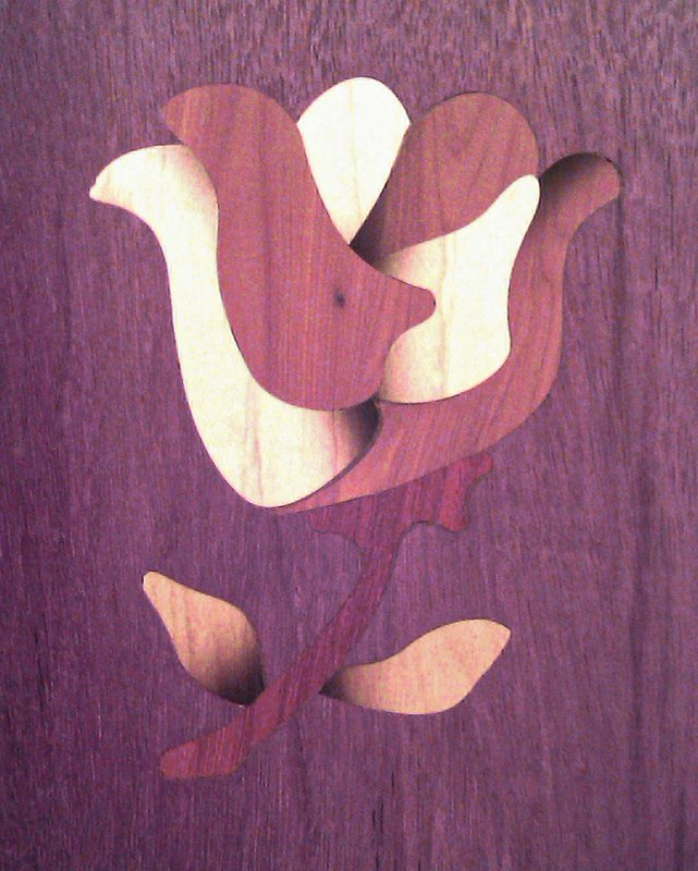 Image of the RoseBud inlay built on Purple Heart